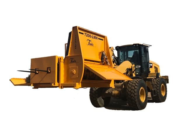 7200-LMH Bale Processor by Fair Manufacturing on a front end loader