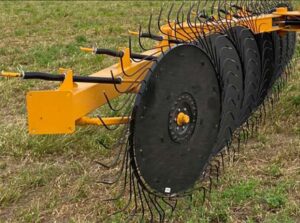 Fair Manufacturing Hay Rake - dual spring wheel suspension