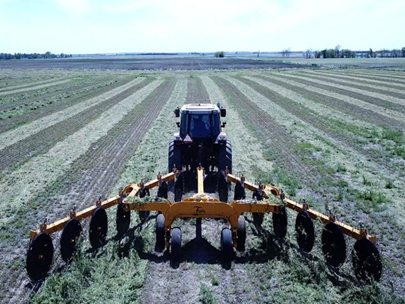 Fluff hay windrows with the Fair Manufacturing Hay Rake