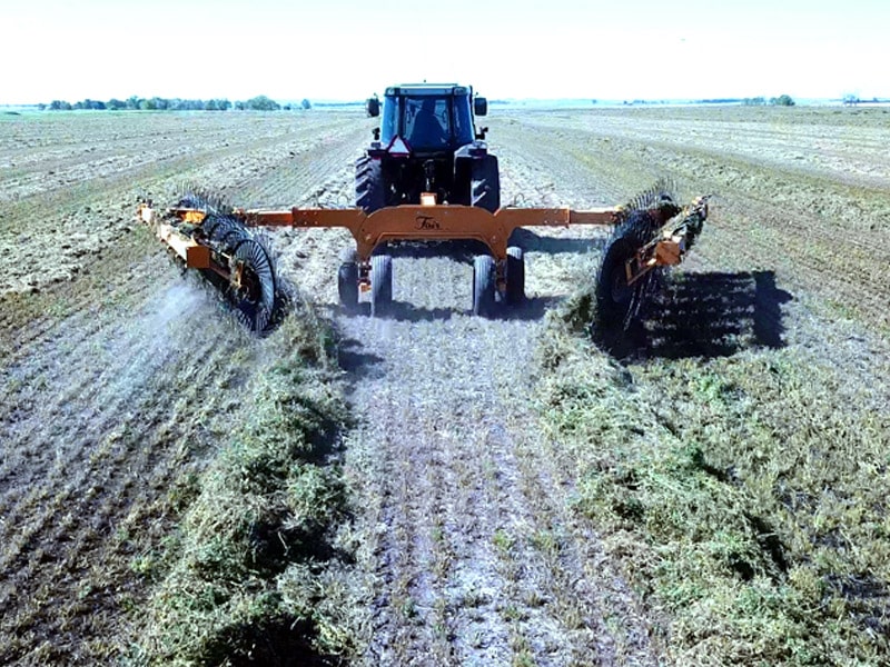 Turn hay windrows